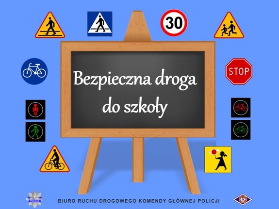 grafika akcji tablica szkolna na której jest napis bezpieczna droga do szkoły wokół niej są znaki drogowe