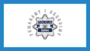 Zdjęcie przedstawia logo żywieckiej Policji